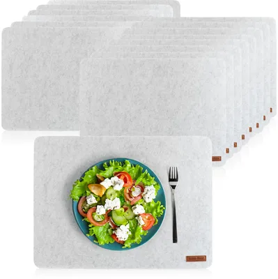 Produktbild von com-four® 16x Platzset abwischbar aus Filz - 44 x 32 cm Platzmatte - hitzebeständiges Tischset für 16 Personen - extra dicke, rutschfeste Platzdeckchen, Filzunterlage