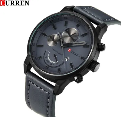 Close-up shot of a men's wristwatch.