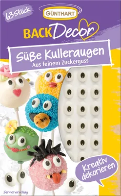 The image shows the packaging of cake decorating supplies, specifically candy eyes, with examples of decorated cakes and cake pops.