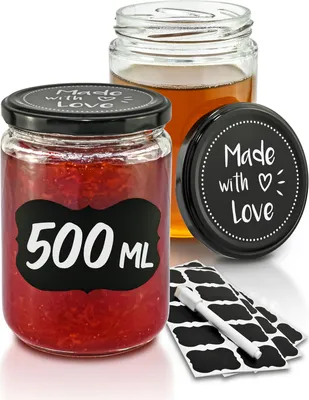 Three glass jars with lids, one filled with red jam, another with honey, and a third lid is separate. There are also small black labels and a white pen.