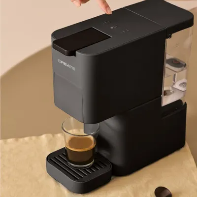 Produktbild von THERA STUDIO - Mehrkapsel-Express-Kaffeemaschine und gemahlener Kaffee
