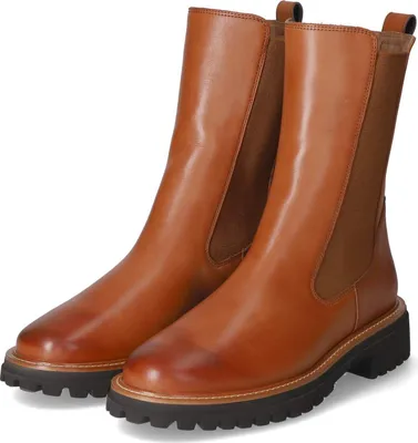 A pair of brown leather Chelsea boots.