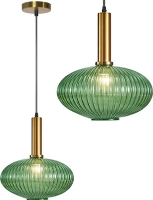 Two green glass pendant lights with gold accents are shown against a white background.