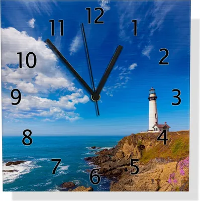 Produktbild von Wallario Design Wanduhr Leuchtturm auf einem Felsvorsprung - Blauer Himmel aus Aluverbund, Größe 30 x 30 cm