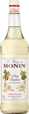A bottle of Monin White Chocolate syrup on a white background.