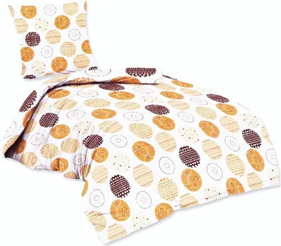 A bedding set with a pillow and duvet cover, both featuring a pattern of circles in yellow and brown tones on a white background.