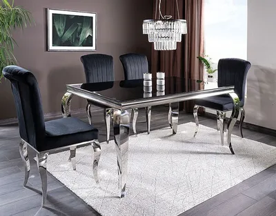 A dining set with a black table and chairs in a room.