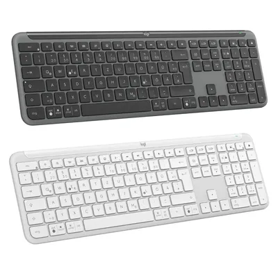 Two keyboards, one gray and one white, are shown side-by-side against a white background.