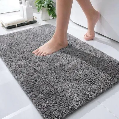 Produktbild von Unyqoos® Badematte rutschfest mit Latexrückseite 60 x 90 cm – 100% Baumwolle, saugfähig & schnelltrocknend, waschbar & trocknergeeignet, für Dusche & Bad, rechteckig, grau