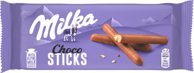 A package of Milka Choco Sticks with a mountain landscape in the background.