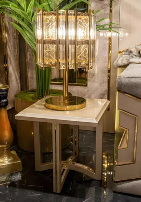 Produktbild von Eleganter Beistelltisch mit goldenen Akzenten für modernes Wohndesign