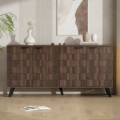 A dark wood sideboard with a textured front is displayed in a well-lit room with a plant and artwork in the background.