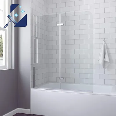 A modern bathroom with a white tiled wall and a bathtub with a glass shower screen.