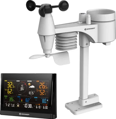 A white weather station sensor unit and a black digital display are shown against a white background.