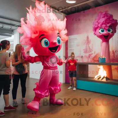 Produktbild von Maskottchenfigur REDBROKOLY eines rosa Feuerschluckers mit Spielanzug und Stirnbändern