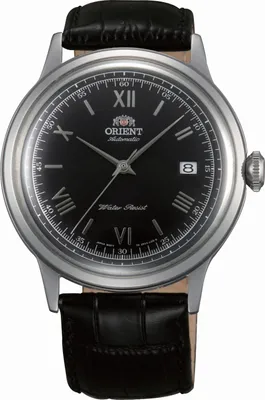 A close-up studio shot of a men's wristwatch.