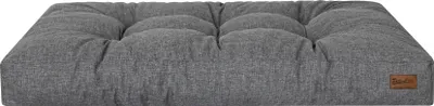 A gray dog mattress is shown from a slightly elevated side angle against a white background.