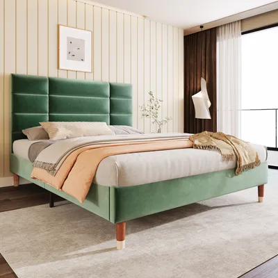 A bedroom with a green velvet bed.