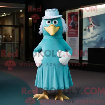 Obrázok produktu pre Maskot spoločnosti REDBROKOLY, azúrový čajka, je zobrazený v šatách po pás a čepici v štýle empire