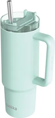 A turquoise blue insulated tumbler with a straw and handle, presented against a white background.