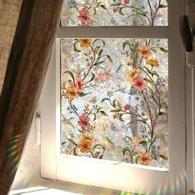 Productafbeelding van Unyqoos® raamfolie, 45x100 cm, van vinyl – geeft een effect van gekleurd glas met een 3D-lasereffect van een regenboog, elektrostatische hechting, herbruikbaar, UV-bescherming, zonwering en privacybescherming