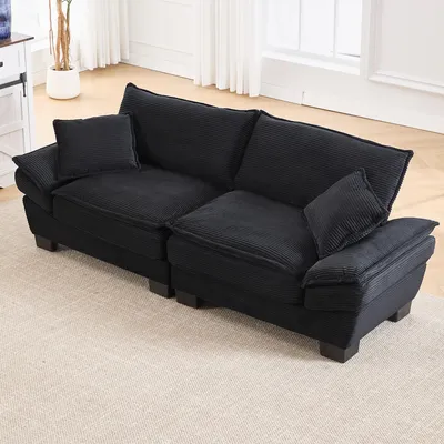 Productafbeelding van Een moderne, eenvoudige tweezitsbank met een comfortabele vulling, voorzien van één kussen. De bank is zacht, ruim en geschikt voor de woonkamer, slaapkamer of het kantoor. Kleur: zwart