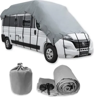 A grey RV cover is shown on a white RV, with the cover folded and bagged below.