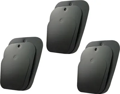 Three stacks of black shoe inserts are arranged diagonally on a white background.