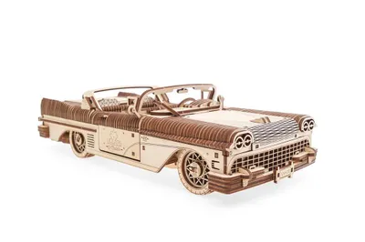 A wooden model of a classic convertible car.