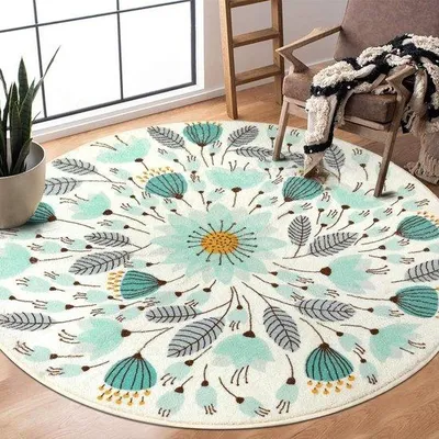 Zdjęcie produktu dla Unyqoos® Okrągły dywan, 120 cm – miękki poliester, wzór kwiatowy w odcieniach niebieskiego i zielonego, niski włos, możliwość prania, antypoślizgowa podkładka lateksowa, idealny do salonu i sypialni