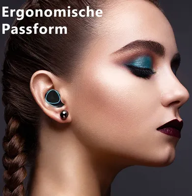 Close-up profile of a woman wearing earbuds and makeup.
