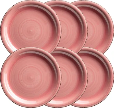 A set of six pink dinner plates stacked on a white background.