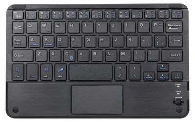 A top-down view of a black wireless keyboard with a built-in touchpad.