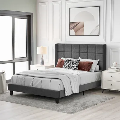 A bedroom scene with a bed, nightstands, and a window.