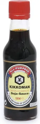 A bottle of Kikkoman Soy Sauce against a white background.