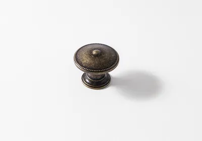 Image de Bouton de meuble Rond vieil or zamak H.24 x l.30 x P.30 mm