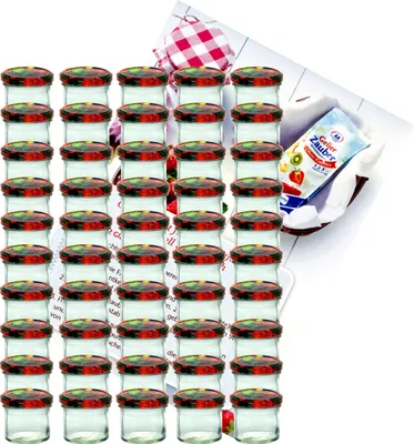 A set of small glass jars with red and green patterned lids, arranged in rows, with a small packet of jelly powder in the background.
