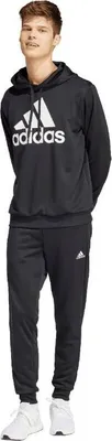A young man wearing an Adidas tracksuit.