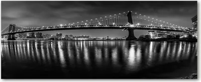 Produktbild von Tulup® Glas-Bild Wandbild aus Glas - 125x50 - Wandkunst - Wandbild hinter gehärtetem Sicherheitsglas - Dekorative Wand für Küche & Wohnzimmer  - Sehenswürdigkeiten & Architektur - Manhattan bei Nacht - Schwarzweiß