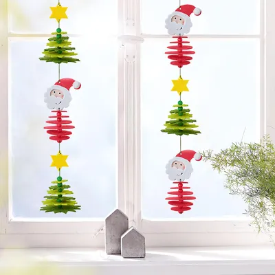 Produktbild von Bastelset - Erstes Fädeln Filzgirlande Weihnachtsmann