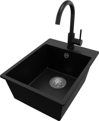 A black granite kitchen sink with a black faucet and drain assembly, isolated on a white background.