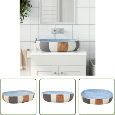 Imagen del producto de Lavabo de cerámica ovalado, de la marca Living Store, disponible en varios colores, con dimensiones de 59x40x14 cm