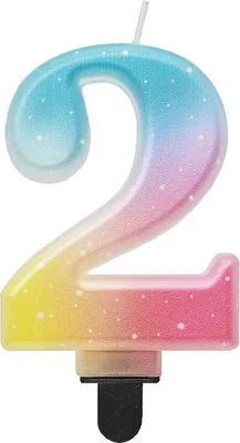 A number 2 candle with a pastel gradient and white speckles.