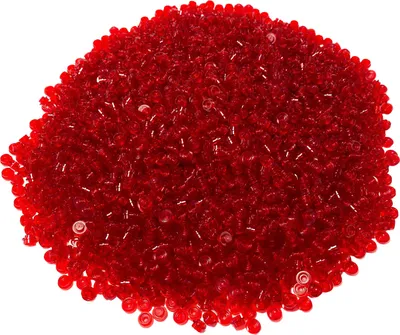 A pile of small, transparent red plastic beads.