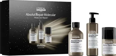 A gift set of L'Oréal Professionnel hair products displayed against a dark, starry background.