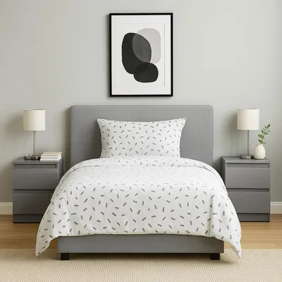 A bedroom scene with a bed, nightstands, and artwork.