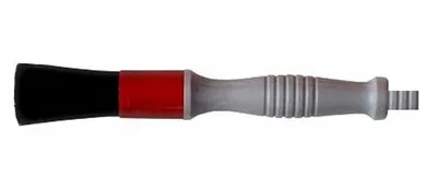 A cleaning brush with a black brush head, a red band, and a gray handle.