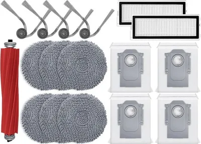 A collection of vacuum cleaner replacement parts arranged on a white background.