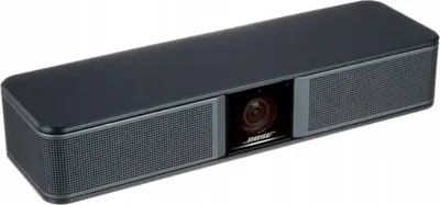 A black Bose soundbar with a camera in the center, shown on a white background.