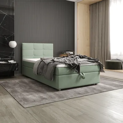 A bedroom scene with a bed as the main focus.